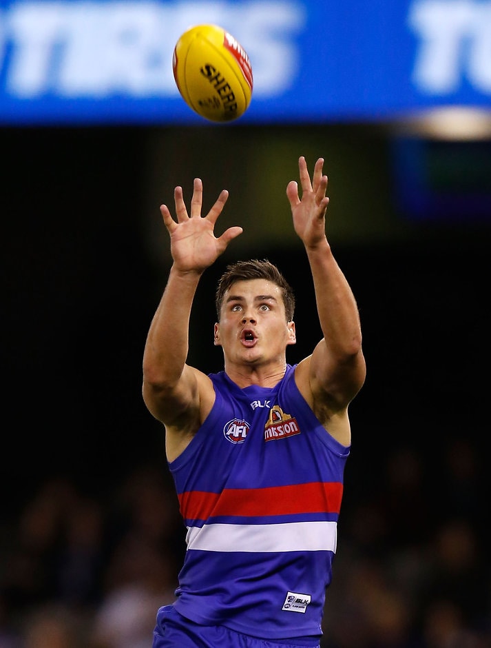AFL 2015 Rd 07 - Western Bulldogs v Fremantle Tom Boyd of the Bulldogs marks the ball during the 2015 AFL Round 07 match between the Western Bulldogs and the Fremantle Dockers at Etihad Stadium on May 17, 2015. (Photo: Michael Willson/AFL Media)